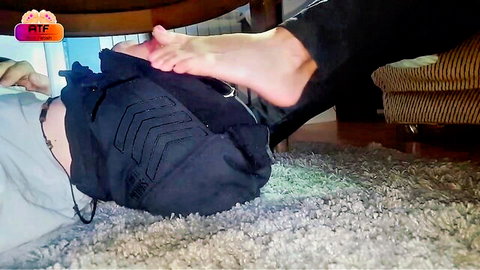 Barefoot MILF presses soles on stepson's backpack-covered face in kitchen femdom foot domination