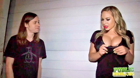 Busty blonde MILF Olivia Austin in low-cut dress giving public handjob