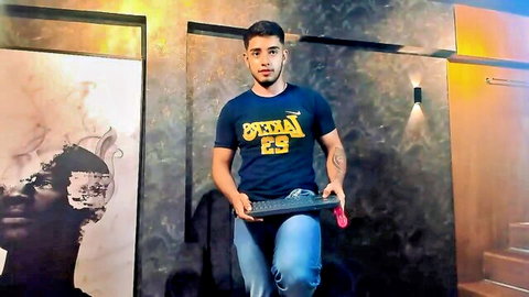Sexy young Latino guy in casual t-shirt and jeans for gay live cam show