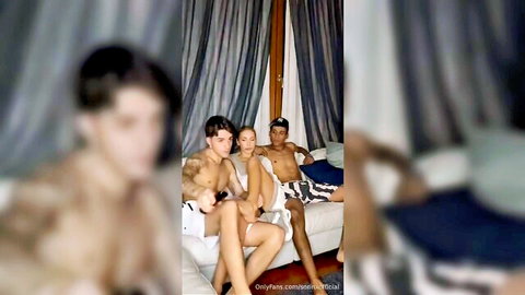 Blonde woman sandwiched between two topless men in steamy threesome teaser