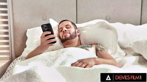 Tattooed hunk in bed, from Ariel Demure's anal scene with friend's husband