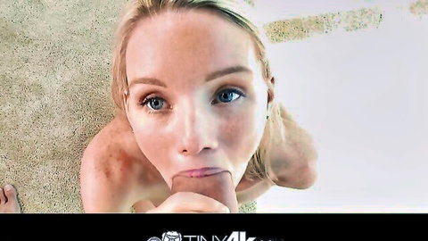 Adorable petite blonde teen giving POV blowjob on big cock