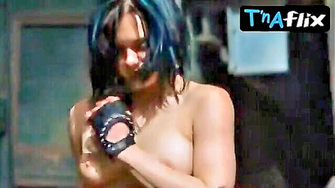 Jynx Vandersteen topless with studded gloves, teasing breasts in Locked Down