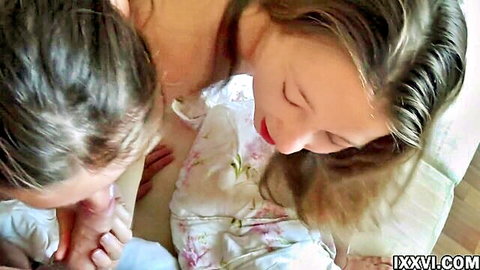 Two Russian student girls in intimate orgy embrace, floral lingerie