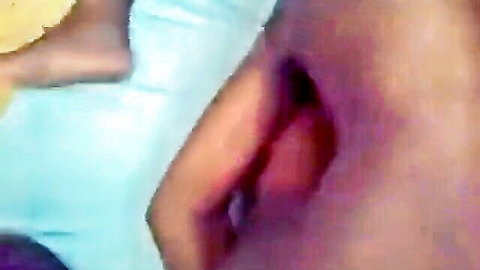 Ebony woman spreads wet black pussy lips with blue panties pulled aside