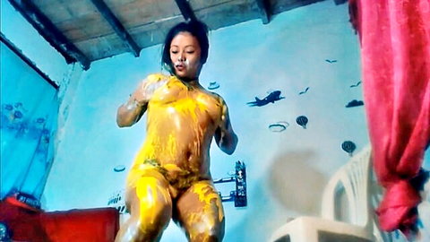 Curvy Asian woman naked and covered in yellow squirt, amateur solo