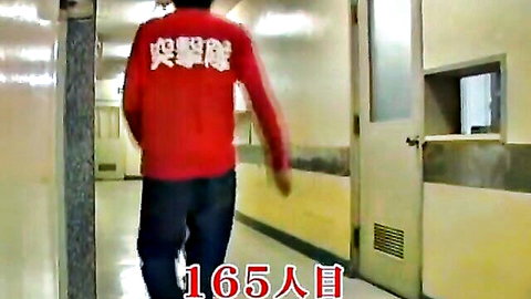 Nurse in red uniform walks hospital corridor after bottom sharking