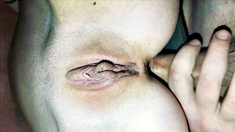 Wife's intense eye close-up during first-time anal sex