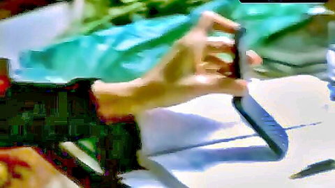 Tania Lamanna in casual desk scene from The Last Don II