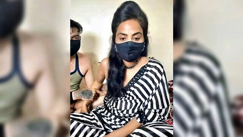 Raat ki rani Indian brunette in striped dress with masked partner touching her arm