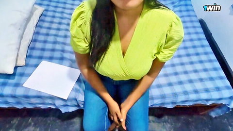 South Asian babe in green blouse showing deep cleavage sitting on bed teasing POV