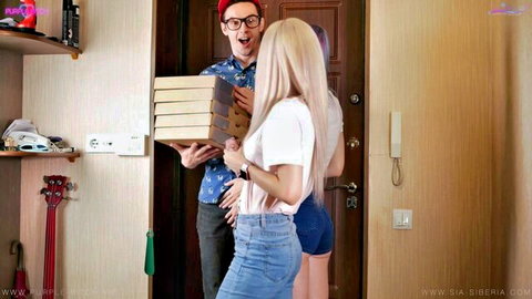 Purple Bitch and friend greet pizza guy at door in casual outfits
