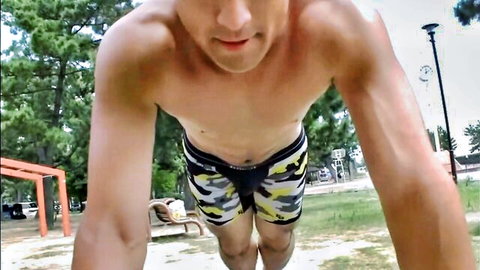 Hairy Japanese hunk Noda Hayato doing outdoor push-ups in camo shorts