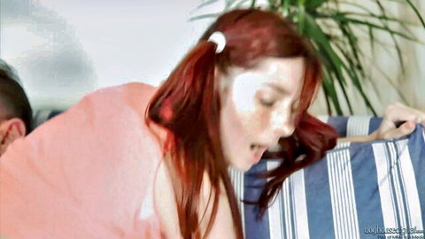 Redhead pigtailed babe with thick cum facial mask on face and open mouth on couch