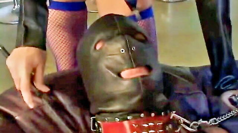 Blonde dominatrix with small tits controls masked slave