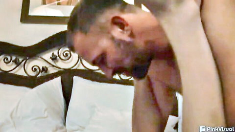 Bearded dilf passionately embraces young guy in intimate bedroom encounter