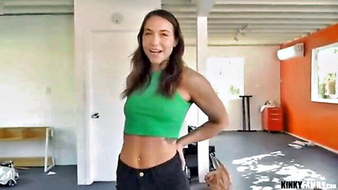 Madison Wilde smiling in green crop top and jeans, home alone tease