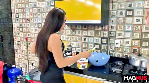 Latina beauty in black dress cooking seductively, Magnus Filmes preview
