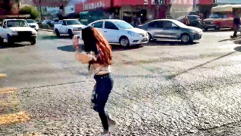 Luis Garay's sexy redhead in crop top and jeans dancing outdoors in threesome preview