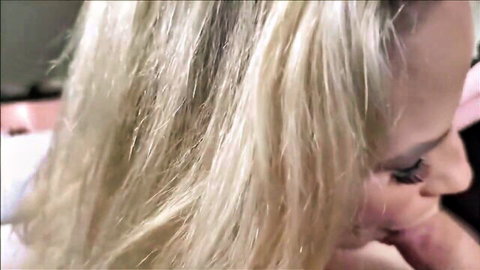 Sexy blonde with long hair puckers lips kissing man's skin in teasing POV closeup