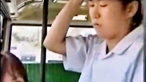 Japanese woman in bus giving teasing handjob, uncensored public fun