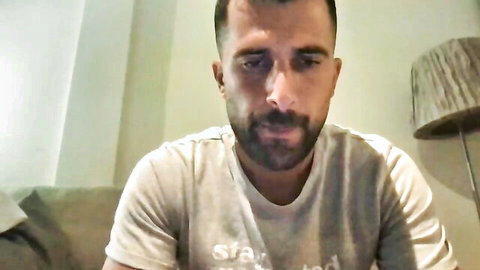 Alex877x bearded gay man in gray staff t-shirt, gangsta tattoo style