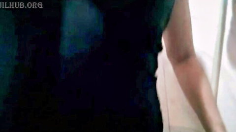 Sexy Indian woman pulls up green top exposing medium tits in amateur solo striptease