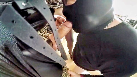 Mature t-girls in leather mask and leopard dress hand on penis at party