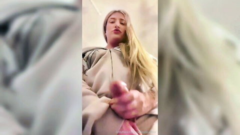 Blonde Cadence Caliber teases perky tits, pinching nipple in open hoodie