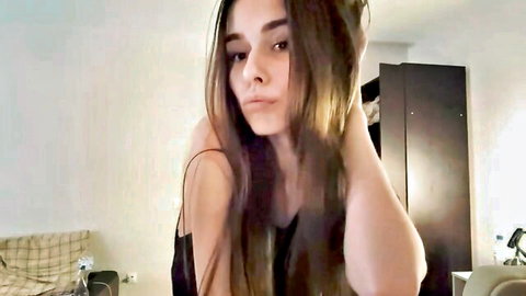 Cute shy 18yo Fannygilbertson in black spaghetti strap top, teasing on Chaturbate