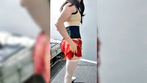 Asian shemale strip tease in red frilly lingerie and white stockings