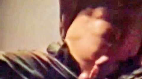 Captured soldier tied up in bondage with foot grab in camo uniform