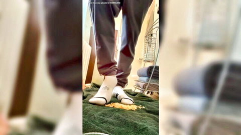 Giantess feet in white socks crushing on wet bathroom floor