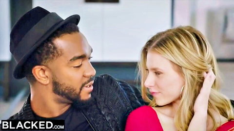 Blonde woman and ebony man in close intimate pose, striving for IG fame