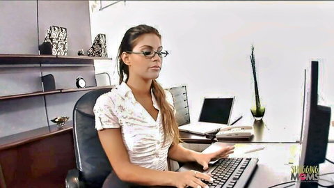 Blonde MILF in glasses typing at office desk, fantasizing about hardcore anal