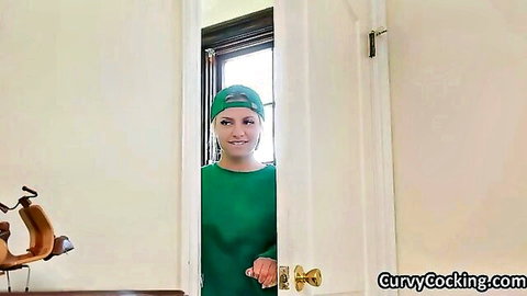 Curvy soccer babe in tight green uniform showing juicy tits after training