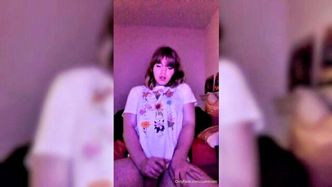 Blurry purple-lit solo masturbation thumbnail of brunette in floral t-shirt
