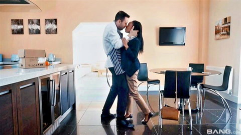 Lola Marie in passionate ebony couple kiss, office attire embrace