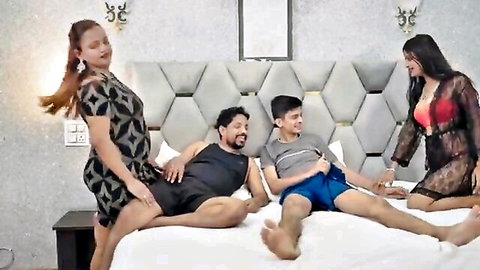 Indian couples in lingerie and shorts on bed for steamy group orgy
