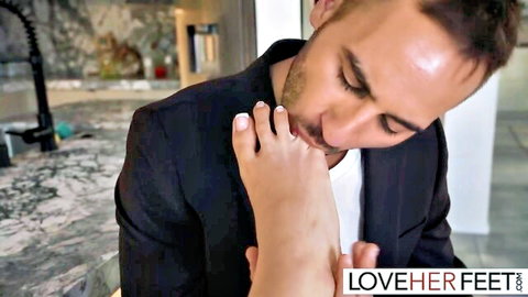 Roxie Sinner's painted toes teased by suited man in foot worship scene