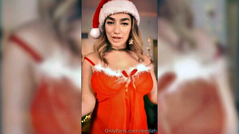 Leedah in sexy Santa lingerie, teasing cleavage for Christmas ASMR