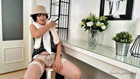 Mature Russian GILF with big tits spreads legs exposing hairy pussy masturbating with dildo