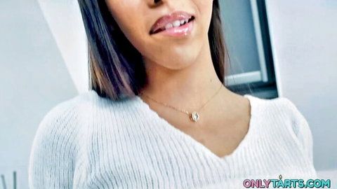 Lia Lin smiling seductively in white sweater, stepdaughter tease