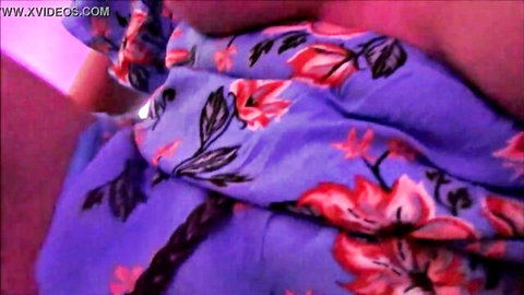 Curvy stepmom exposing breast in purple floral dress alone