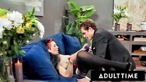Horny redhead MILF in stockings touched by suited man