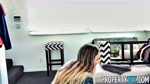 Blonde real estate agent tours house in denim top, seductive pose