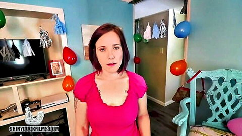 Jane Cane in pink top welcoming stepson, red hair and cleavage tease
