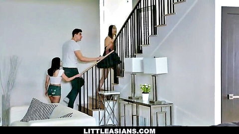 White guy leads two petite Asian girls upstairs, one flashing small ass in tiny shorts
