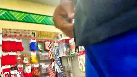Sneaky amateur upskirt view in holiday store aisle