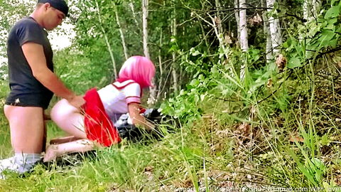 Pink-haired Japanese anime cosplay girl fucked doggy style in forest